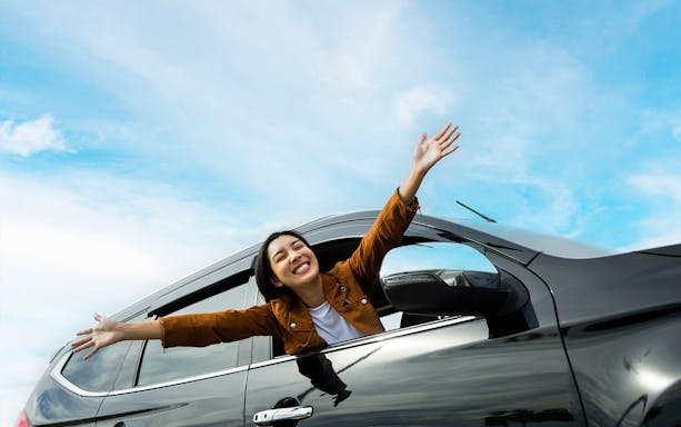 Person enjoying a ride in a private car transfer from Changi Airport, Singapore.