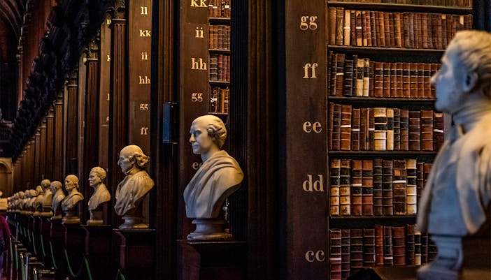 The Long Room at Trinity College Library, Dublin, showcasing historic books and The Book of Kells.