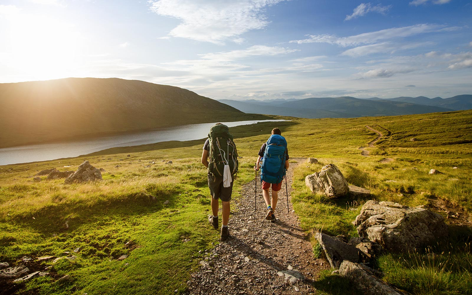 Jacobite Steam Train crossing Glenfinnan Viaduct in the Highlands, Isle of Skye tour.