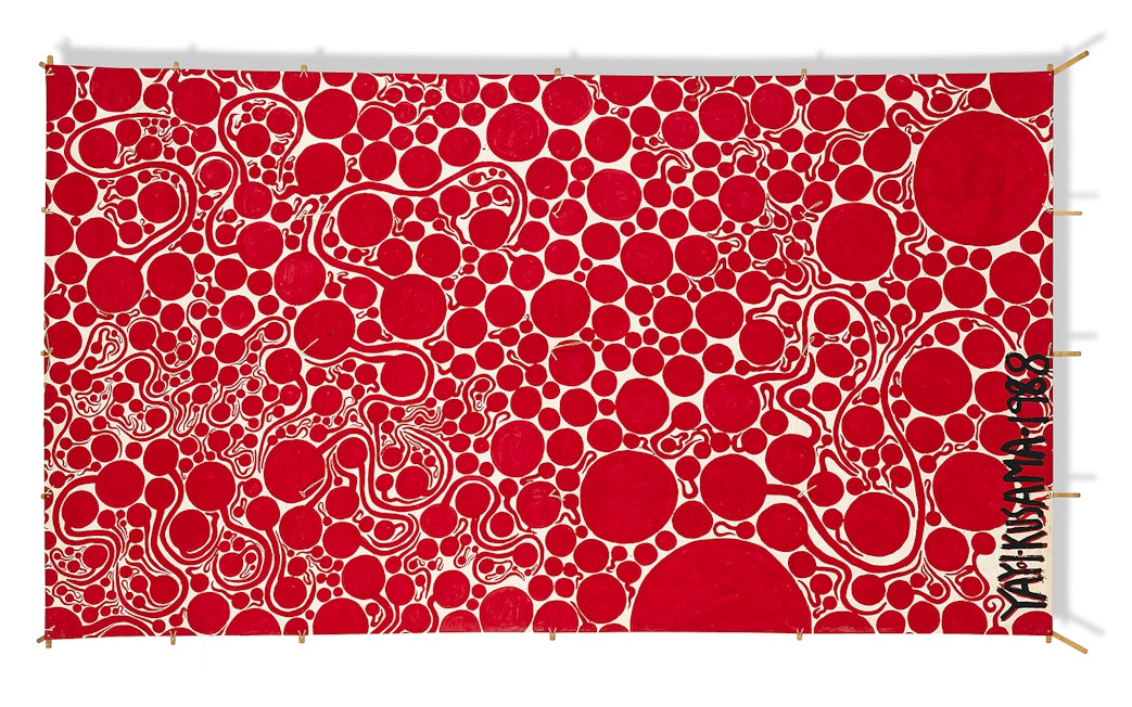 Red polka dot artwork by Yayoi Kusama at Moco Museum London.