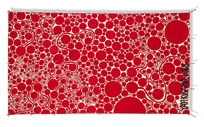 Red polka dot artwork by Yayoi Kusama at Moco Museum London.