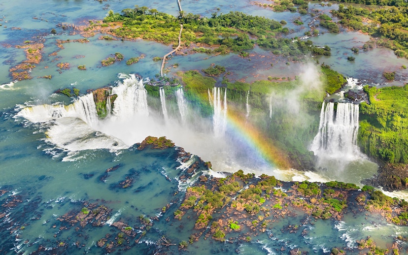 Aerial view of Iguazu Falls with rainbow, Argentina-Brazil border.