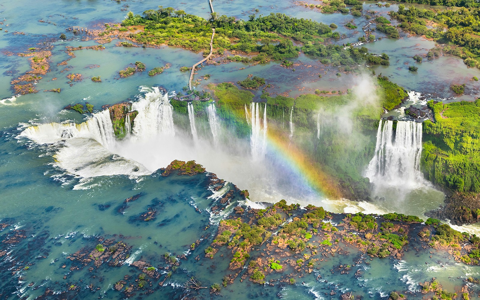 Aerial view of Iguazu Falls with rainbow, Argentina-Brazil border.