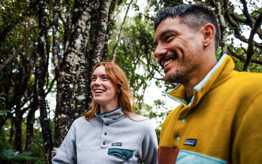 Tourists enjoying nature on Stewart Island Village & Bays Tour.