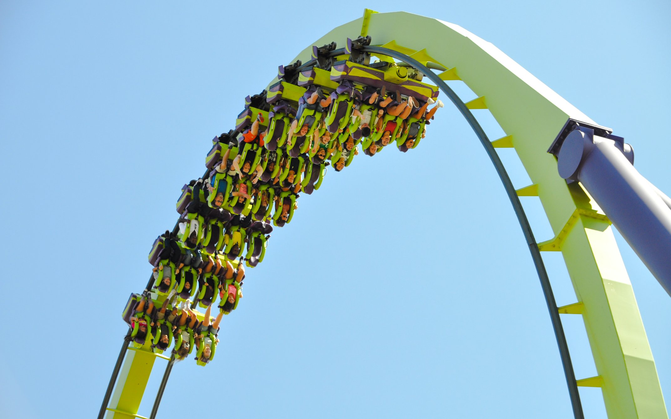 Riders on Medusa 2 roller coaster loop at Six Flags Discovery Kingdom.