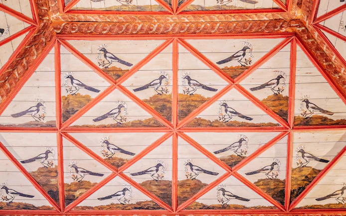 Ceiling art with magpie motifs in the Room of Magpies, National Palace of Sintra.