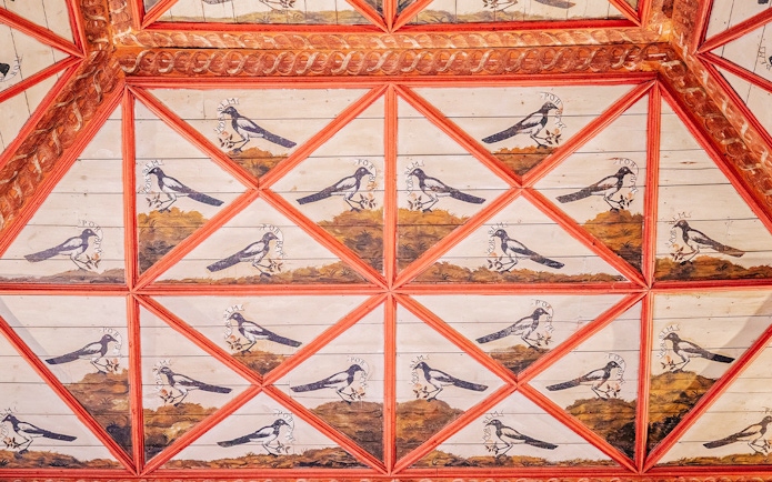Ceiling art with magpie motifs in the Room of Magpies, National Palace of Sintra.