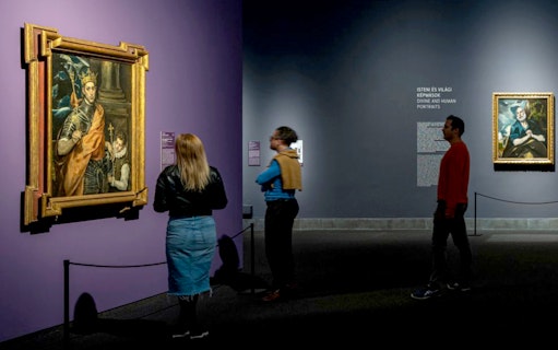 Visitors viewing El Greco paintings at the Museum of Fine Arts Budapest exhibition.