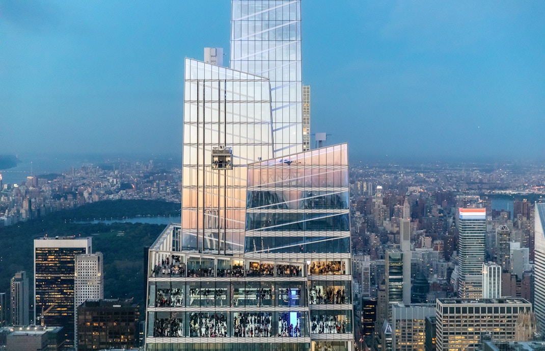 Summit One Vanderbilt observation deck with panoramic New York City skyline view.