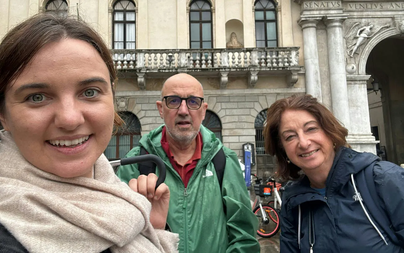 Visitors exploring Padua's historic architecture during a self-guided city game.