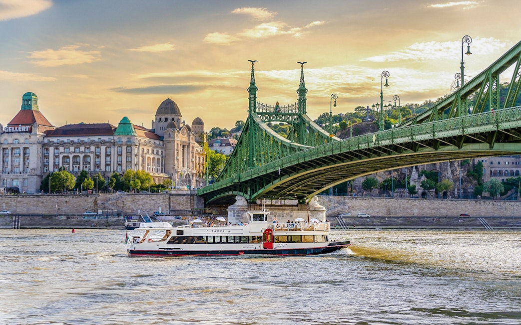 Sightseeing cruise on the Danube River near Liberty Bridge, Budapest.