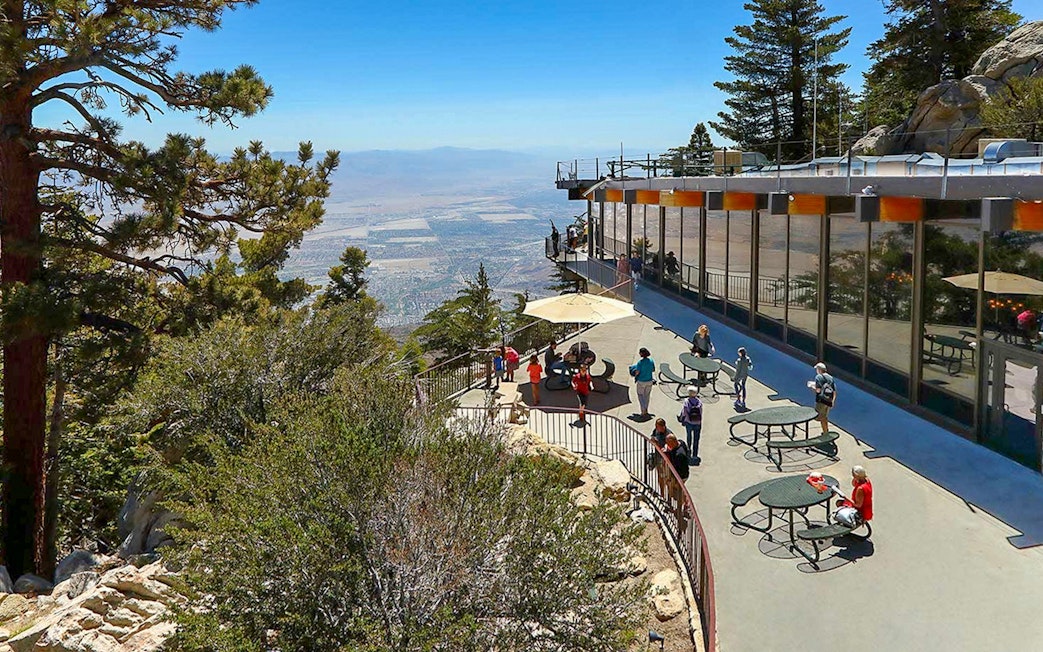 Visitors enjoying the view from the Palm Springs Aerial Tramway observation deck.