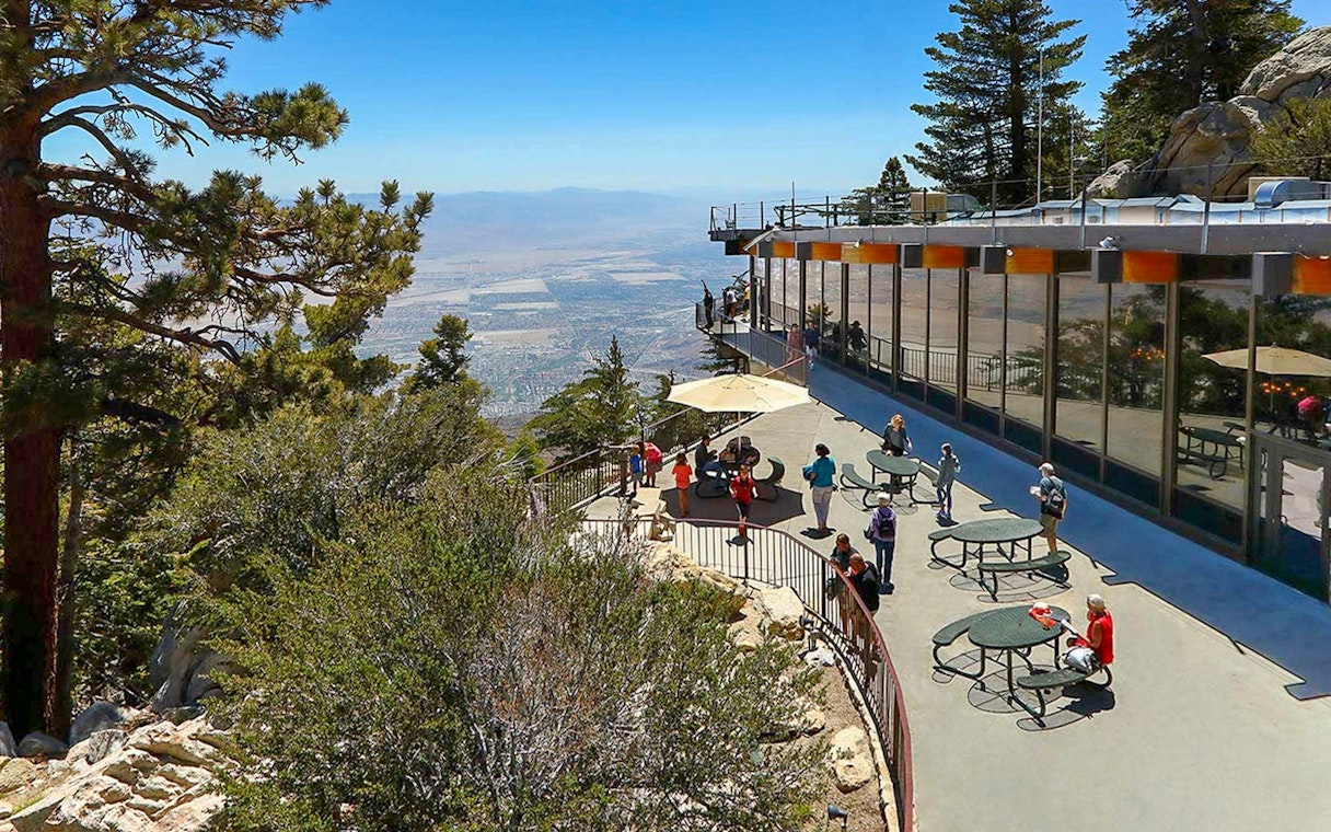 Visitors enjoying the view from the Palm Springs Aerial Tramway observation deck.