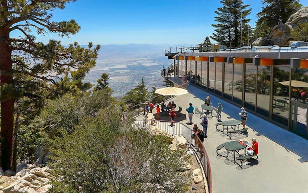 Visitors enjoying the view from the Palm Springs Aerial Tramway observation deck.