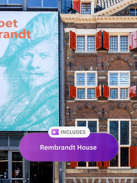 Rembrandt House Museum exterior with red shutters and promotional banner in Amsterdam.