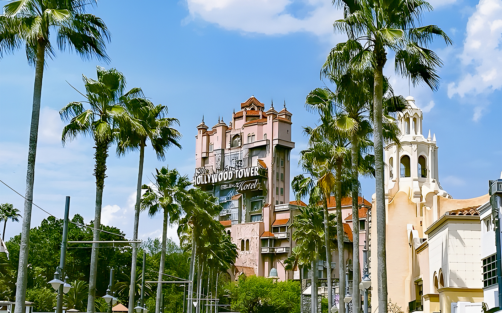 Hollywood Tower at Disney's Hollywood Studios, Walt Disney World, Orlando, surrounded by palm trees.