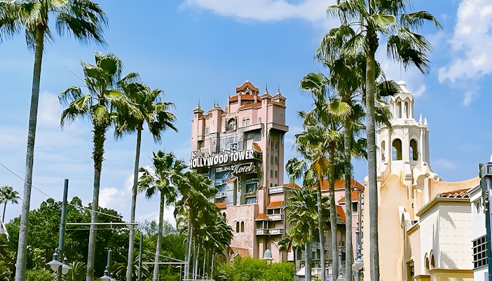 Hollywood Tower at Disney's Hollywood Studios, Walt Disney World, Orlando, surrounded by palm trees.