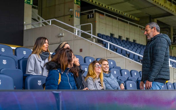 Visitors seated in a stadium during the Match Day Tour with exclusive access and museum visit.