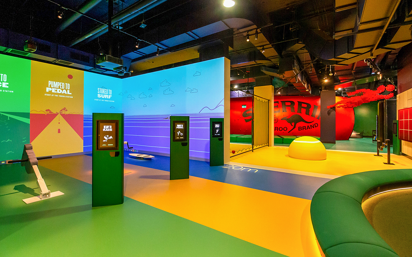 Interactive sports exhibits at Melbourne Cricket Ground tour.