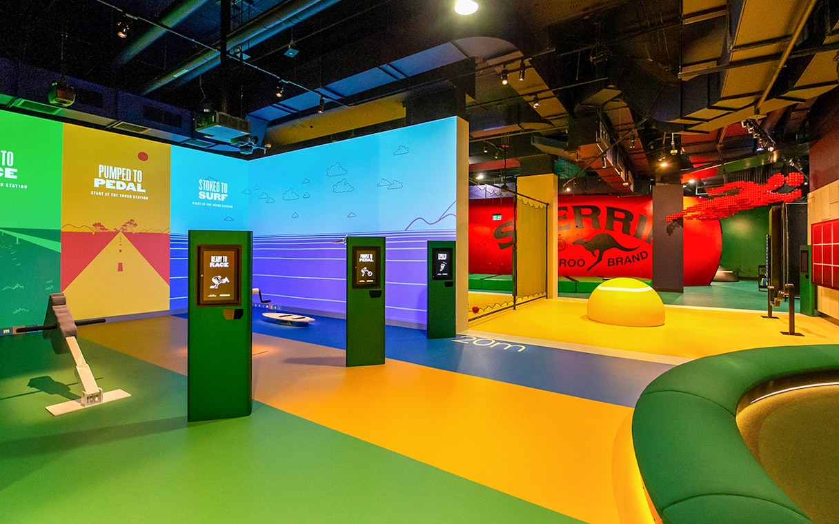 Interactive sports exhibits at Melbourne Cricket Ground tour.