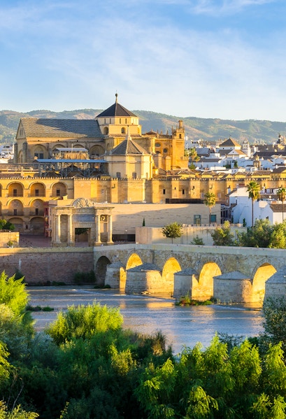 Cathedral and Roman bridge over the Guadalquivir River in Córdoba, Spain.