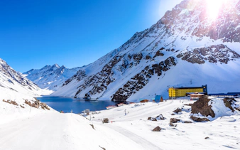 Portillo ski resort and Laguna del Inca with snow-covered Andes mountains, Santiago.