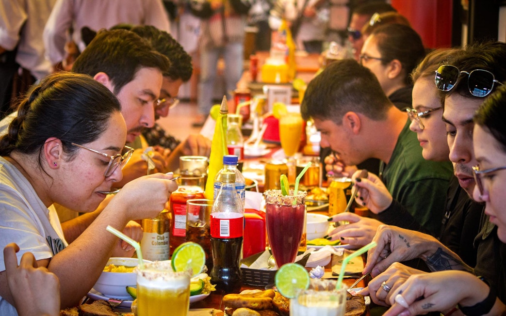 Tourists dining after visiting Zipaquira Salt Cathedral and Guatavita Lake, Colombia.