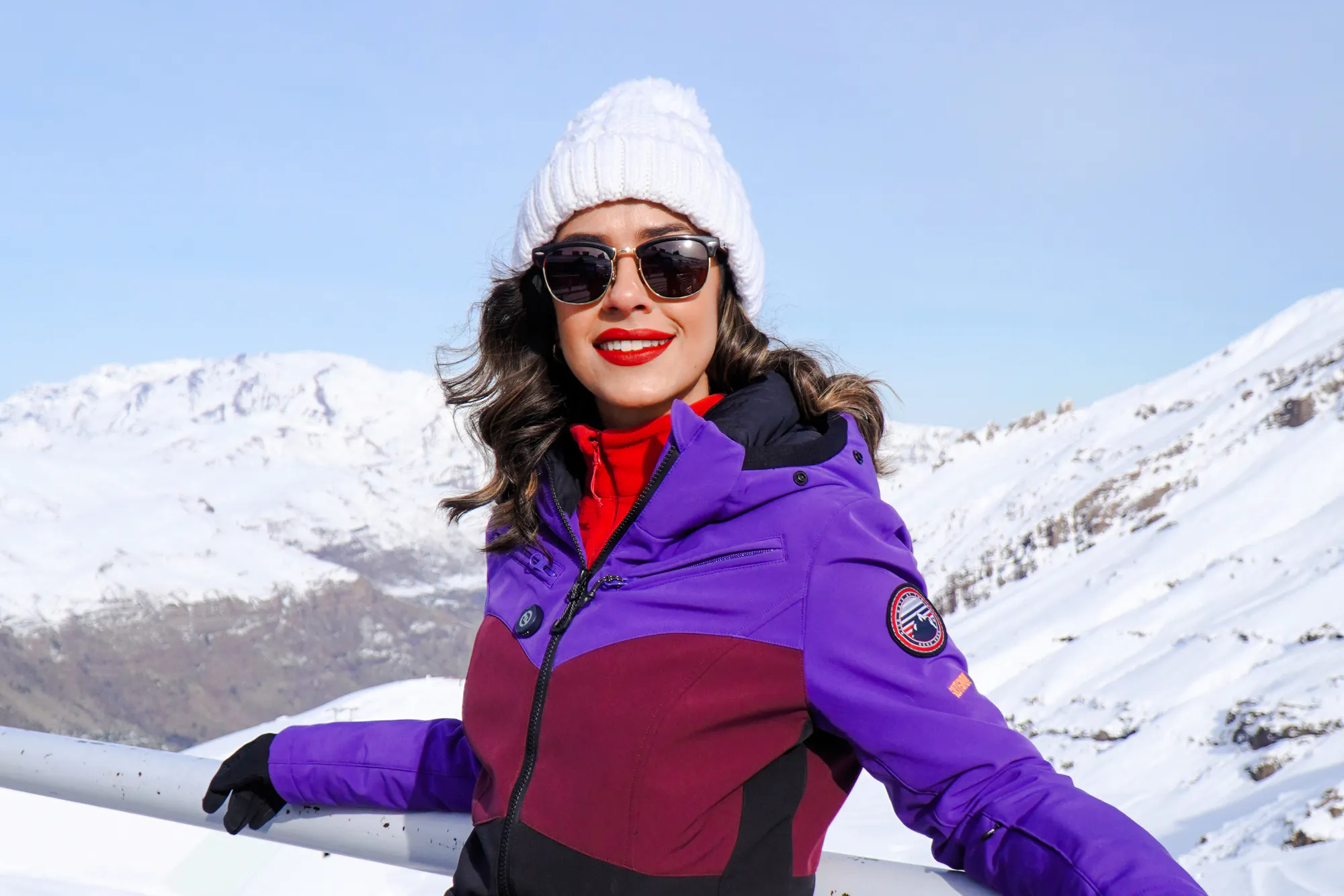 Person enjoying snowy mountain view on Valle Nevado tour, Santiago.
