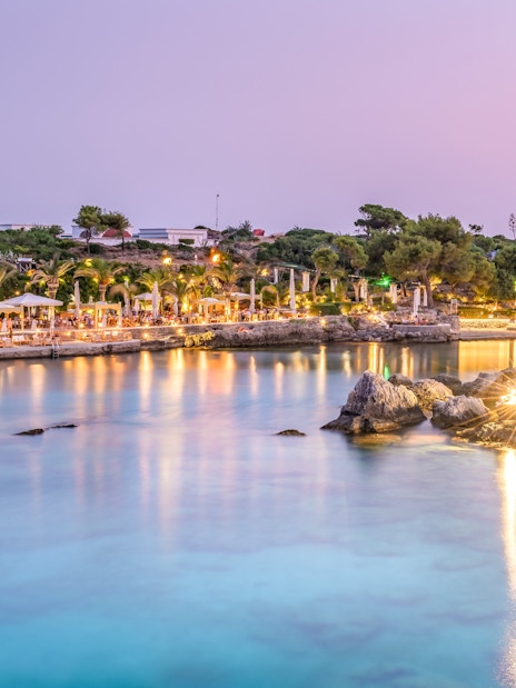 Kallithea Springs illuminated at dusk with reflections on the water, Rhodes, Greece.