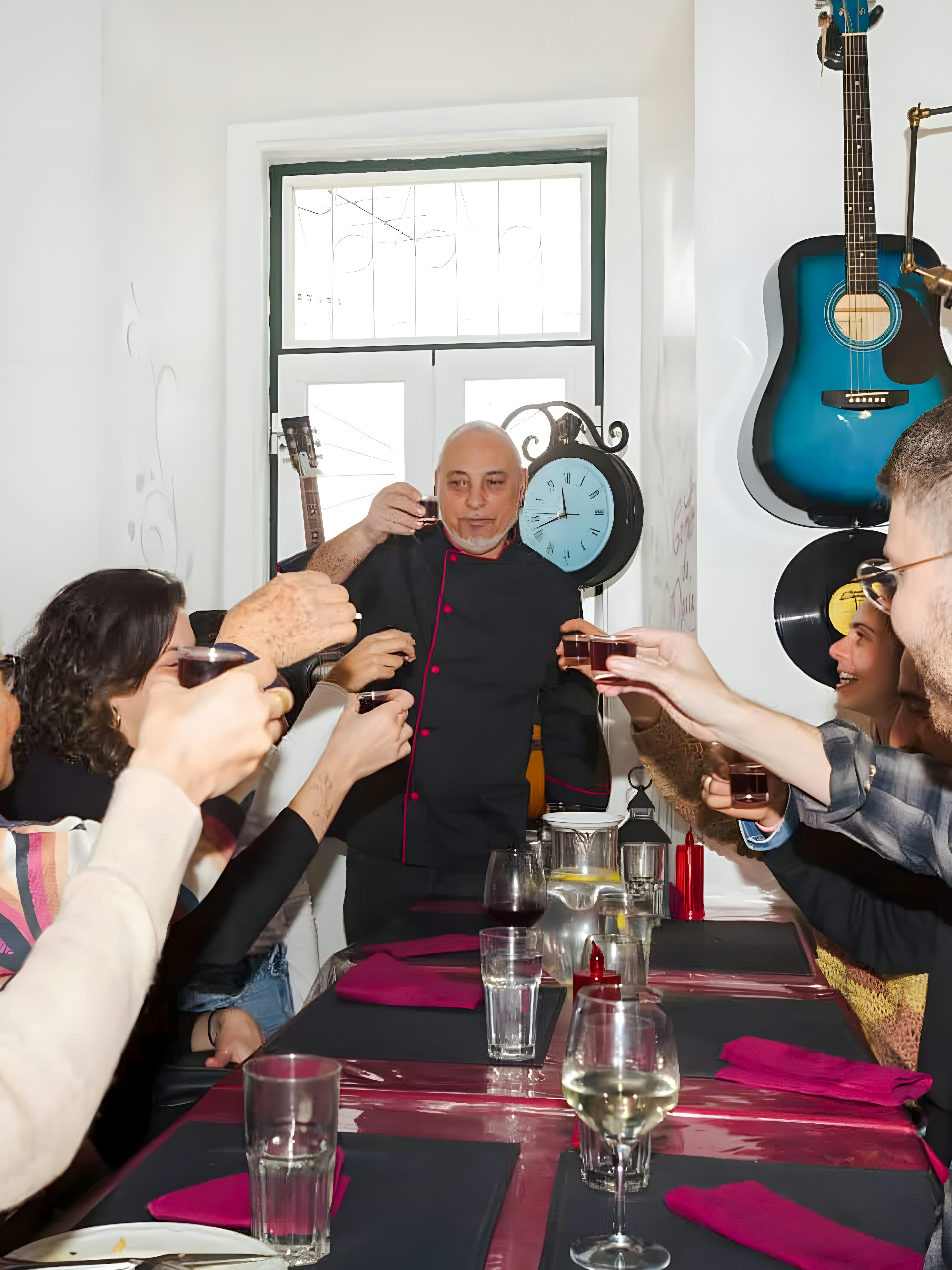 People enjoying ginginha cherry liquor in Lisbon street setting.