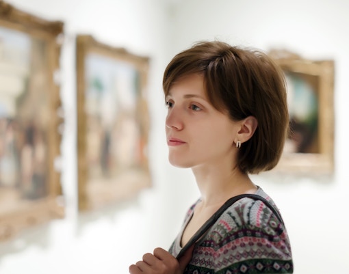 Visitors admiring artwork at the Montegna Gallery in Hampton Court Palace