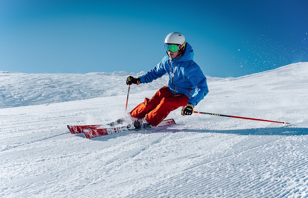 Skiing at snow covered mountains
