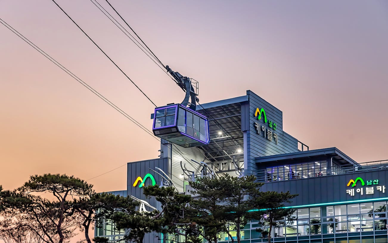 Namsan cable car station with cable car at sunset, Seoul, South Korea.