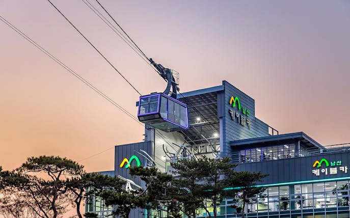 Namsan cable car station with cable car at sunset, Seoul, South Korea.