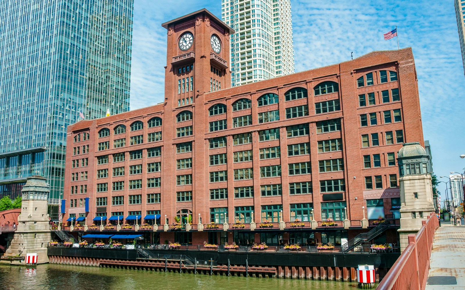 Reid Murdoch Building with clock tower by the Chicago River.