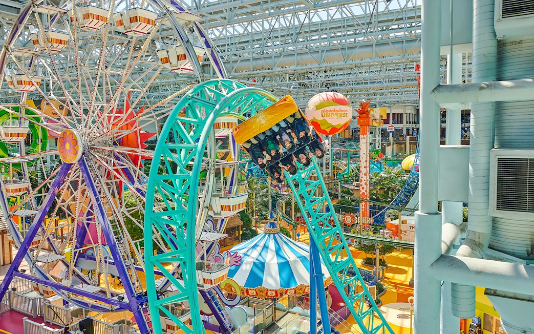 Guests on a roller coaster at Nickelodeon Universe, Mall of America.
