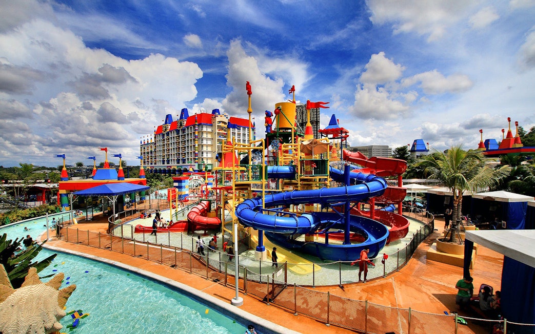 Colorful water park with slides and pools at Legoland Malaysia Resort.