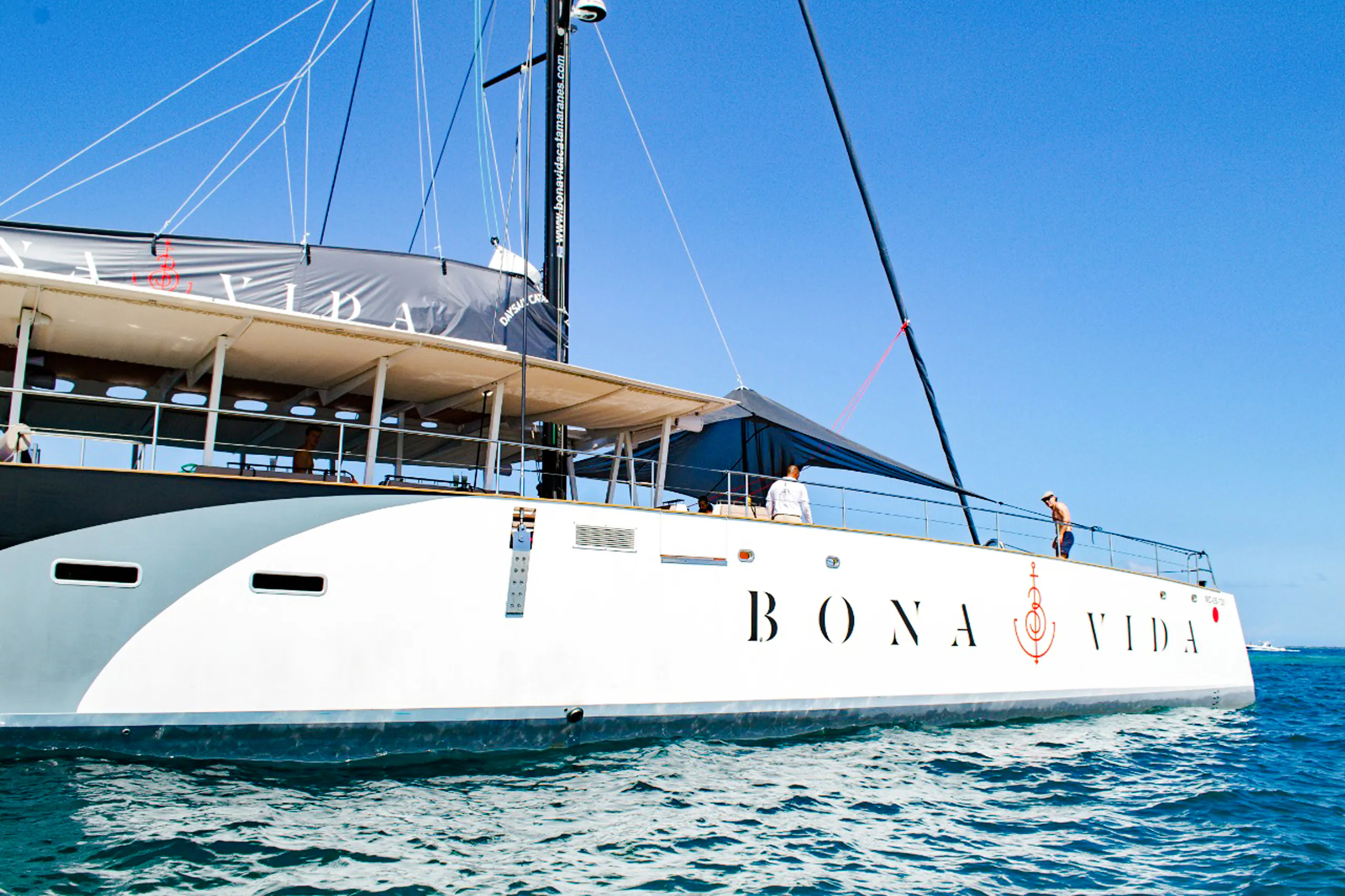 Catamaran sailing on clear waters during sunset tour in Cartagena.