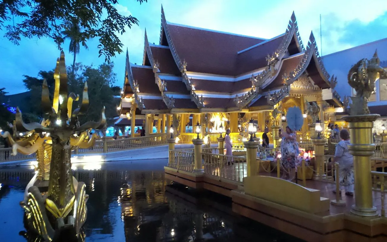 Phuket FantaSea Show entrance with ornate Thai architecture and visitors exploring.
