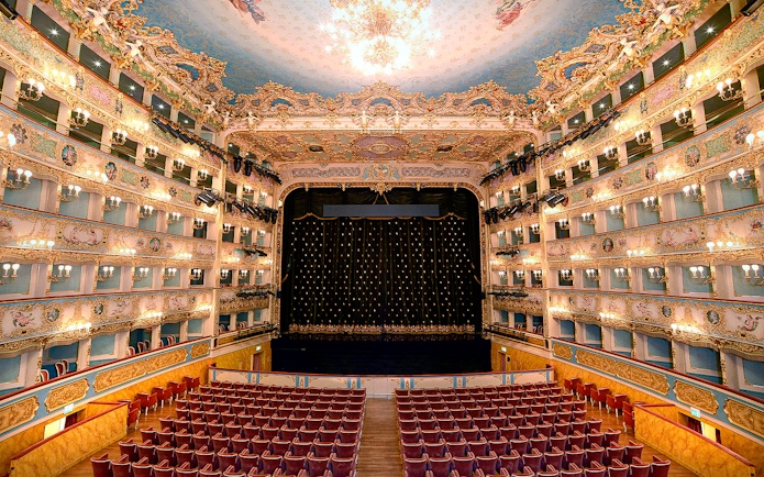 Fenice Theater interior with ornate balconies and stage, Venice.