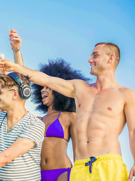 Group of people toasting on a boat during Metopi, Agistri & Aegina cruise.