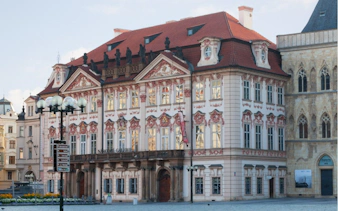 Baroque architecture of Kinský Palace in Prague, part of the self-guided city exploration game.