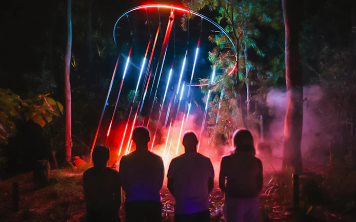 Tourists viewing light display at Astra Lumina, Currumbin Wildlife Sanctuary.