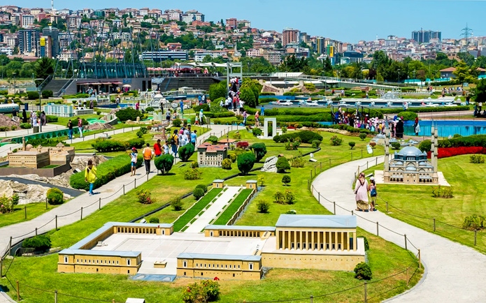 Guests exploring miniature landmarks at Istanbul Miniatürk park.