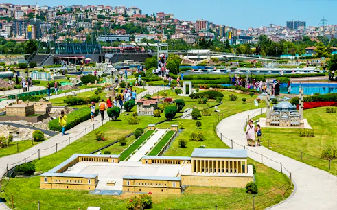 Guests exploring miniature landmarks at Istanbul Miniatürk park.