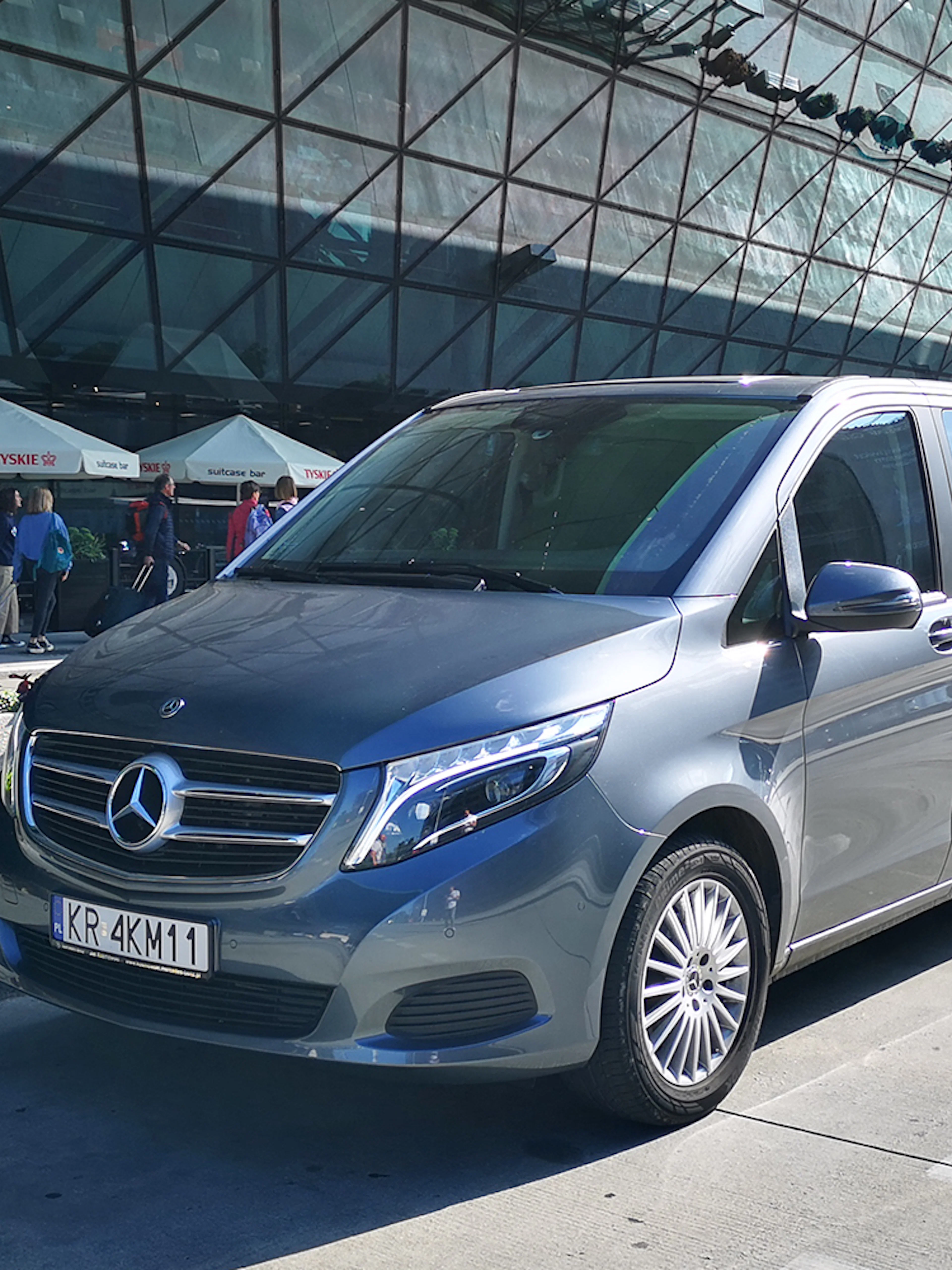 Minivan parked at Gdansk Airport for transfers to Gdynia city.