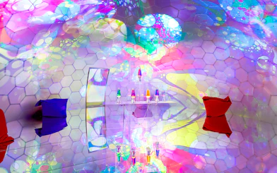Colorful bubble-themed room with hexagonal patterns and lava lamps at Bubble Planet, Seattle.