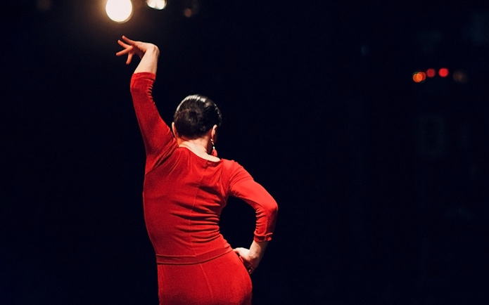 Flamenco dancer performing at Torres Bermejas in Madrid.