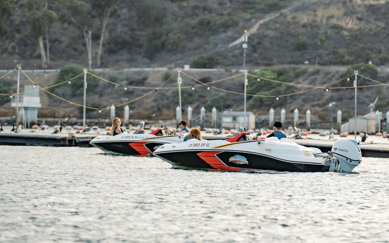 Speed boats on San Diego bay during adventure tour.