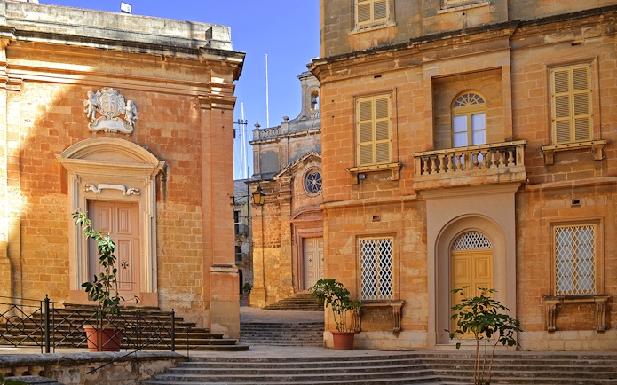 Historic buildings in The Three Fortified Cities, Malta, showcasing traditional architecture.